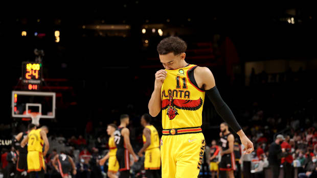 Jan 12, 2022; Atlanta, Georgia, USA; Atlanta Hawks guard Trae Young (11) takes a moment before the start of their game against the Miami Heat at State Farm Arena.